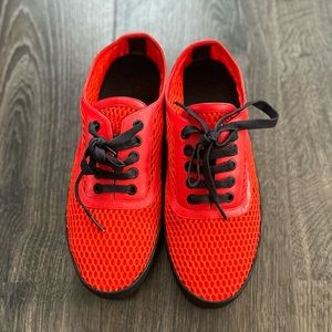 Red-Orange Mesh knit upper with black rubber bottom soles